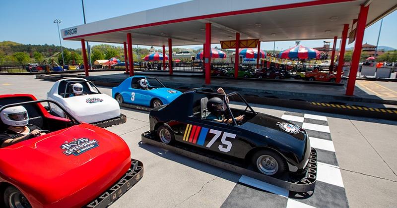cars at starting line on smoky mountain speedway track