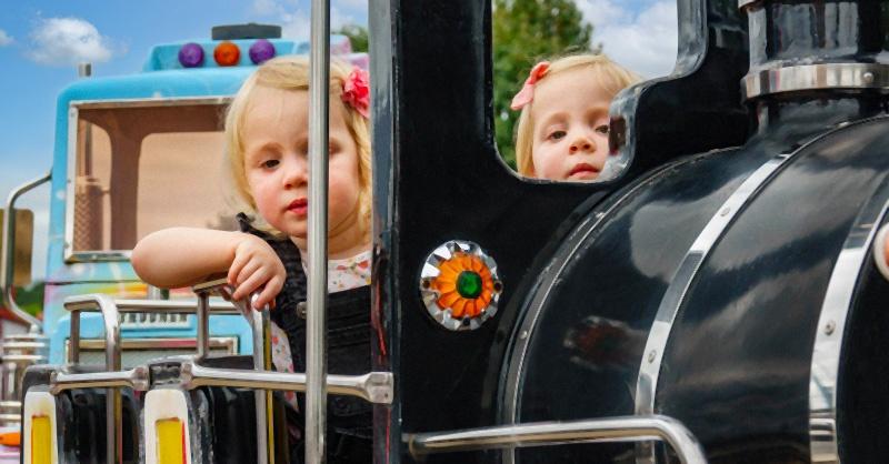two girls on sparkie express train